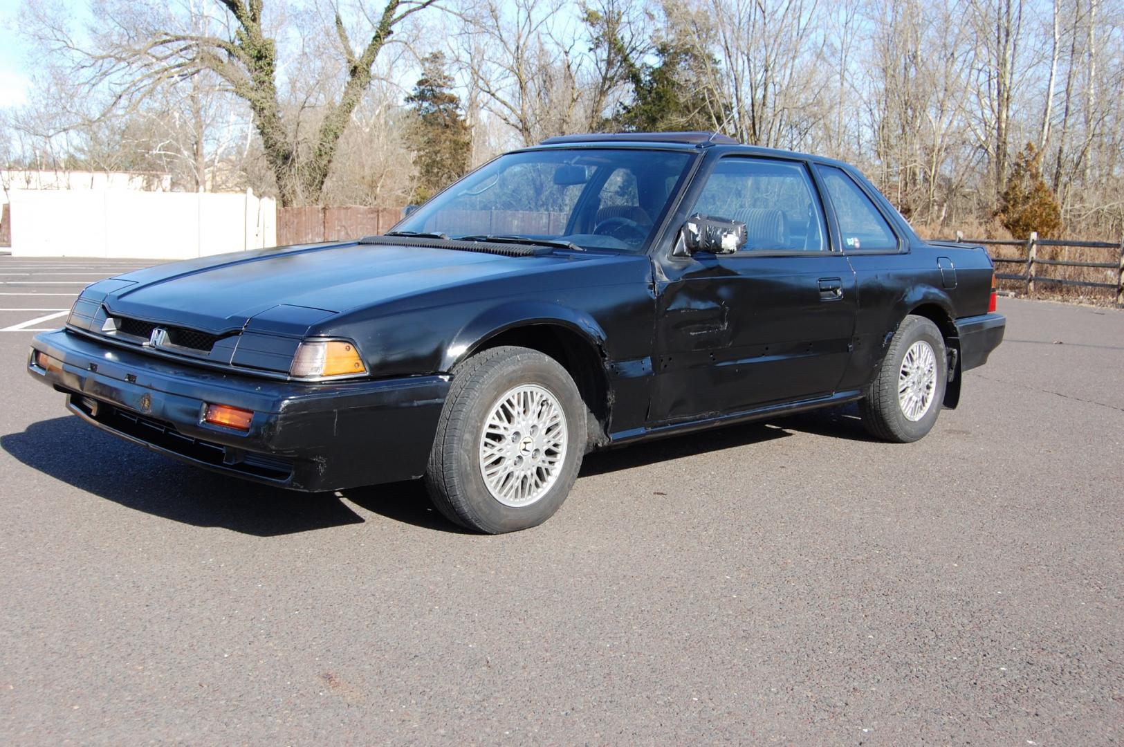 1987 Black /Gray Honda Prelude Si (JHMBA3248HC) with an 2.0L 4 cylinder engine, Automatic transmission, located at 6528 Lower York Road, New Hope, PA, 18938, (215) 862-9555, 40.358707, -74.977882 - Here we have a 1987 Honda Prelude SI with a 2.0L 4 cylinder putting power to the front wheels via an automatic transmission. Options include: gray cloth, power windows/locks/mirrors, AM/FM/TAPE radio, heat/AC, cruise control, tilt steering wheel, 13 inch alloy wheels, pop up headlights and a moon ro - Photo#2